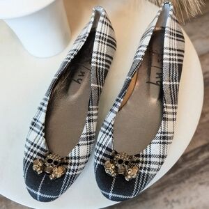 French Sole Black and White Plaid Flats with Skull Accent